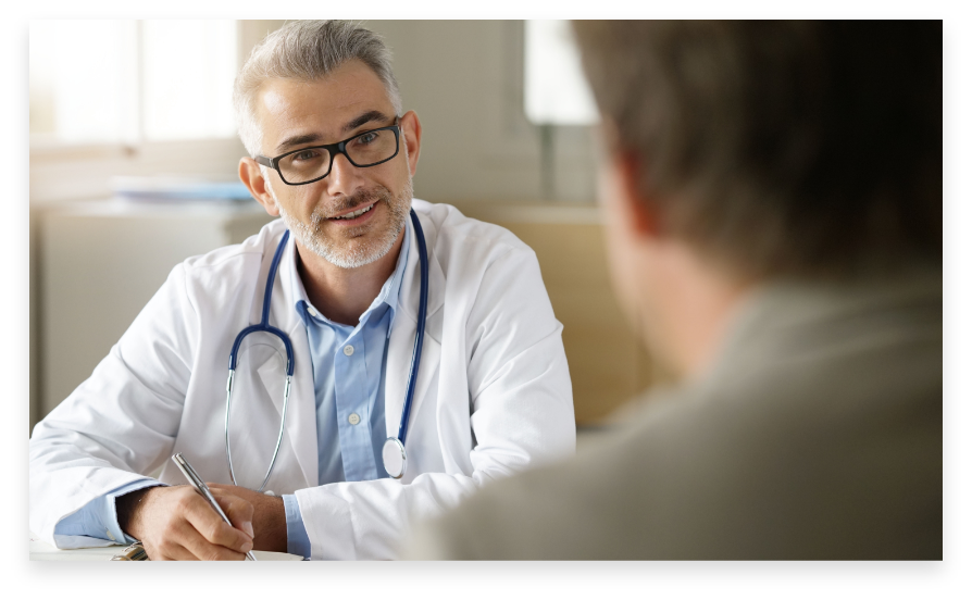 Healthcare provider speaking with a patient