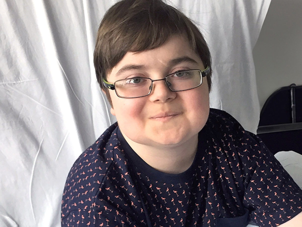 A closeup of a young rare disease patient